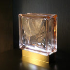 Wireless Blush Bloc Lamp lifestyle shot in modern home setting with atmospheric glow