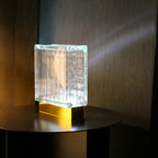 Weave Bloc Lamp detail view of unique crosshatch glass texture and wireless charging base