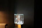 Wired Bolt Bloc Lamp lifestyle shot in modern home setting with atmospheric glow
