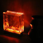 Wired Wave glass block lamp in minimalist interior creating soft ambient illumination