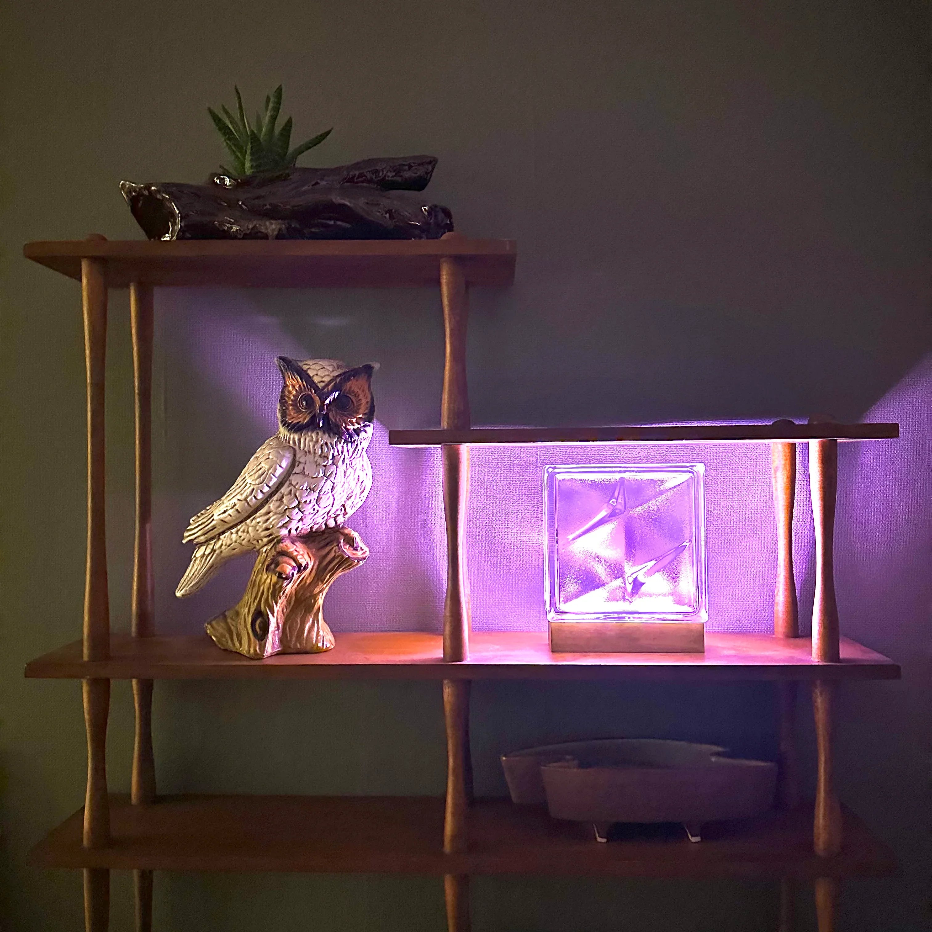 Bolt glass block lamp in home setting with warm atmospheric glow and cordless design